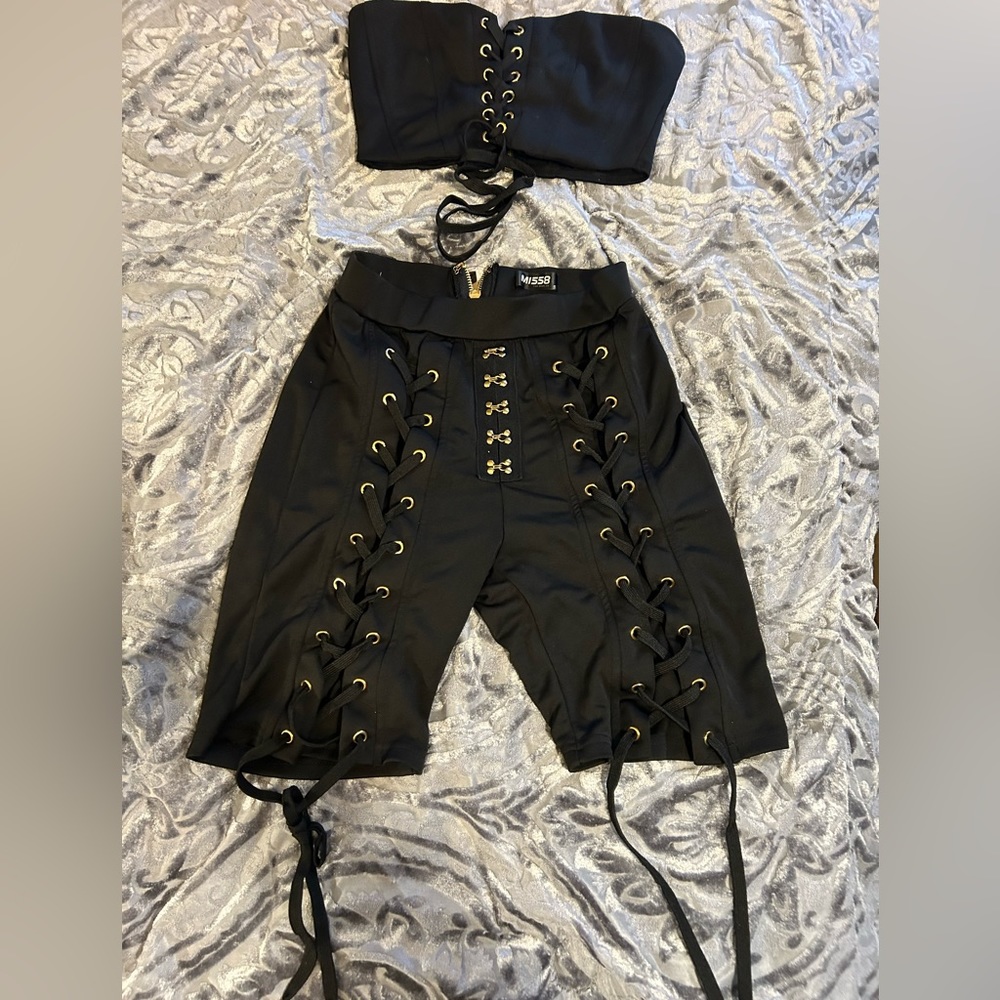 Black two piece party outfit with gold details